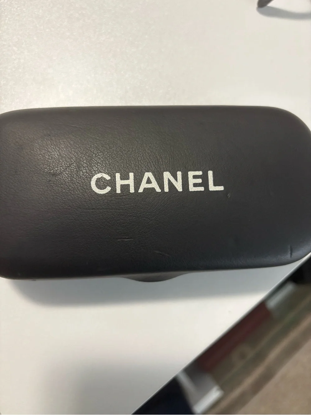 Chanel Black Oval Sunglasses with Dark Blue Lenses